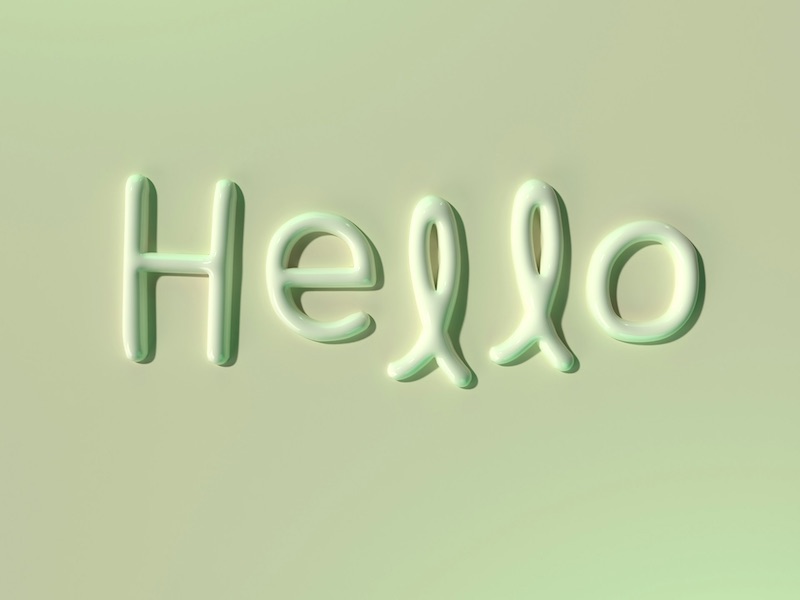 3D text 'Hello' with glossy green finish
