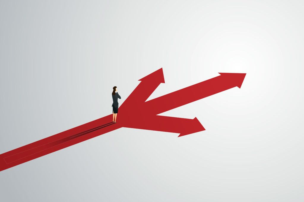 Woman contemplating three diverging red arrows